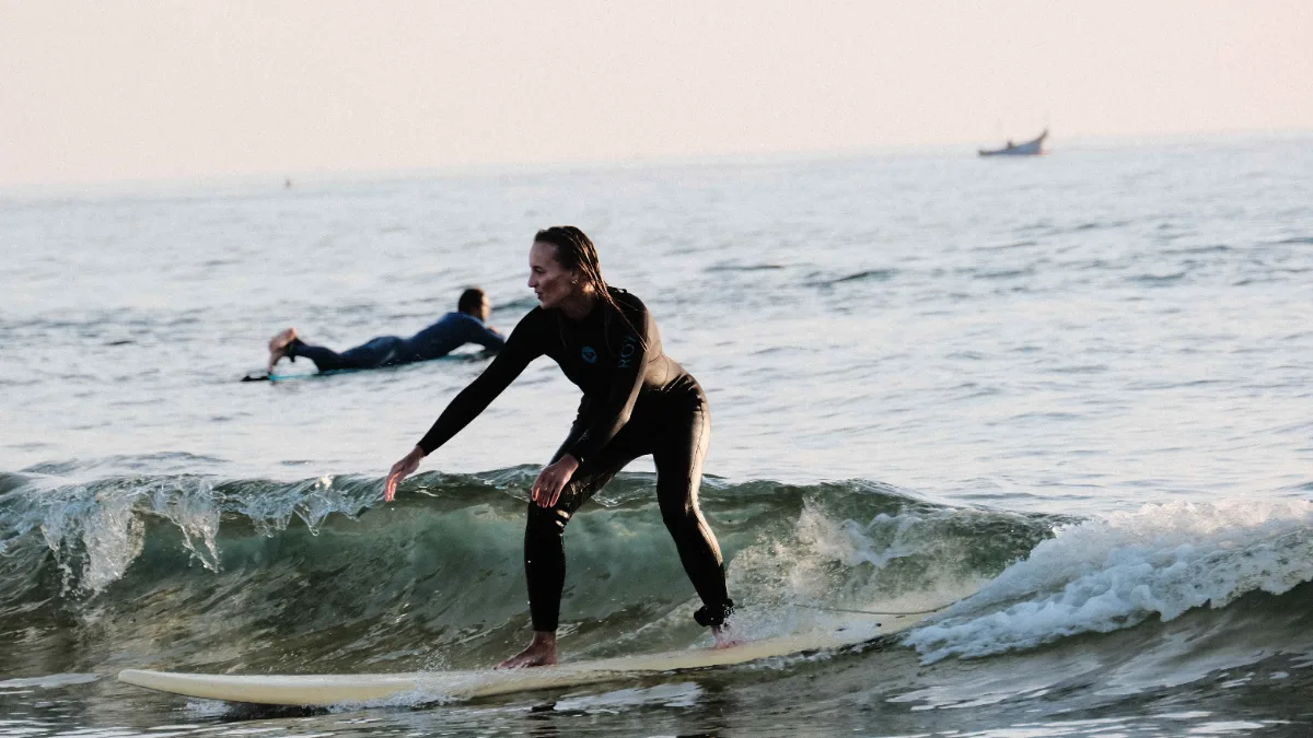 female-surfer-golden-hour